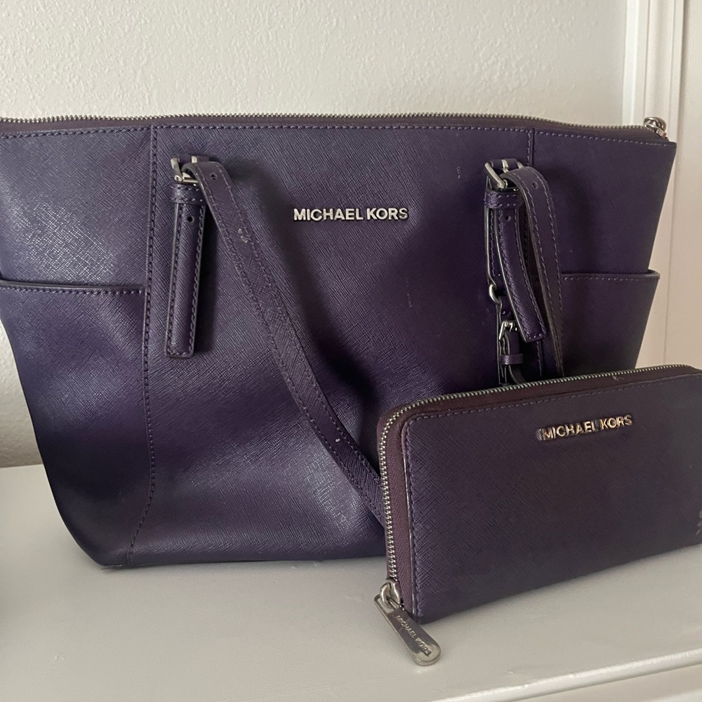 Michael Kors plum colored purse & wallet